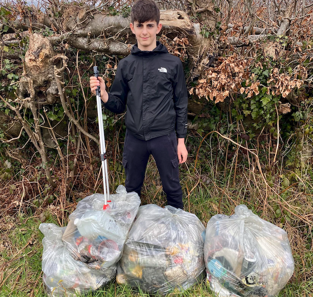 Young cricketer Connor Trott has been litter picking in Dunkeswell to fund-raise for his place on a Devon under-15s tour to South Africa.