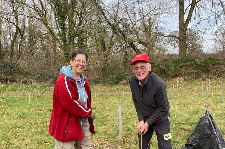 Anita Roy and Steve Saunders at a tree planting session (Woodlands Trust and Wellington Town Council