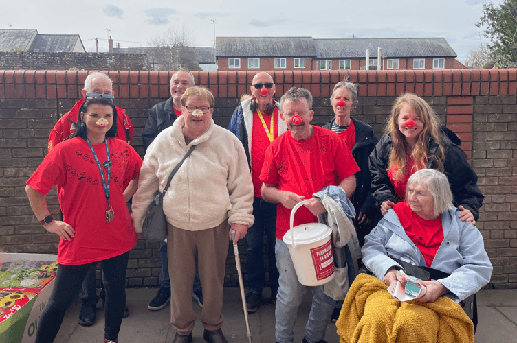 Senior Support Worker Natalia Zimoch, Maggie Doble, Clive Broad, Mike Sedgbeer, Jonathon Rhinds, Gill Redford, staff member Marion Wood and two other residents - Staff and residents of Wellington and Longforth House spent the morning fundraising for Red Nose Day