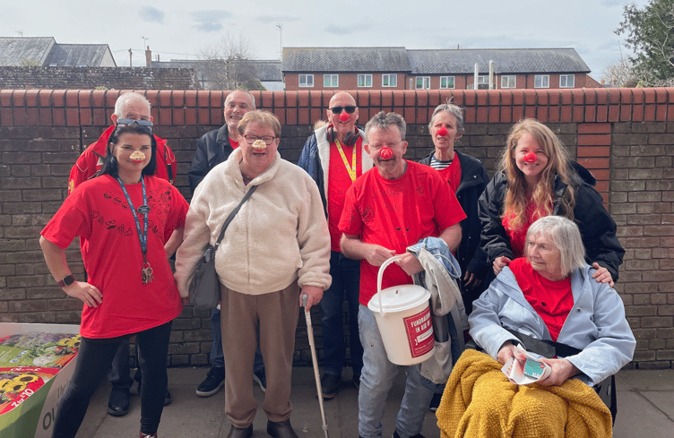 Senior Support Worker Natalia Zimoch, Maggie Doble, Clive Broad, Mike Sedgbeer, Jonathon Rhinds, Gill Redford, staff member Marion Wood and two other residents - Staff and residents of Wellington and Longforth House spent the morning fundraising for Red Nose Day