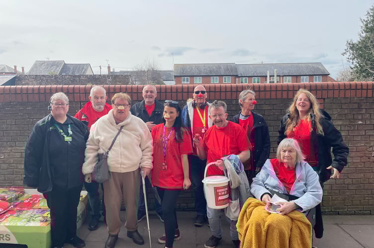 Wellington and Longforth staff and residents thank Asda for their support, allowing them to fundraise outside the Wellington branch