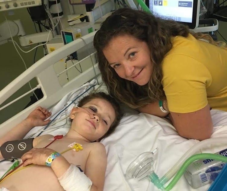 Betty Boland, whose life was saved by the Dorset and Somerset Air Ambulance, and her mum Sarah in hospital. PHOTO: DSAA.