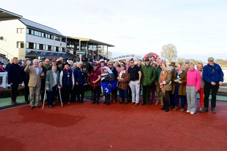 Members of the Don’t Wind Me Up syndicate enjoy the sweet taste of success after their horse triumphed at Taunton on Tuesday (Photo: PPA)
