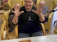 Dementia care residents hold 'car wash' activity