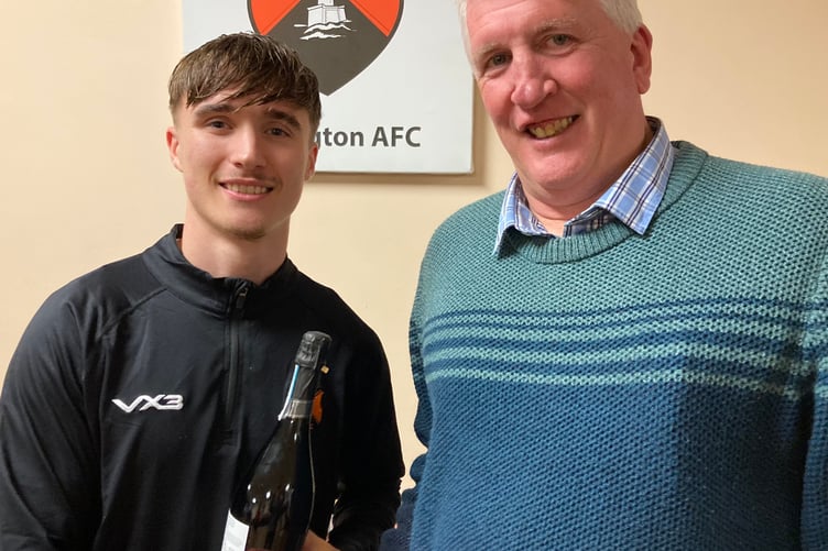 Nathan Byrne was Wellington's Man of the Match and he receives his award from Andy Govier on behalf of match sponsors Mike Rogers, of AFH Wealth Management