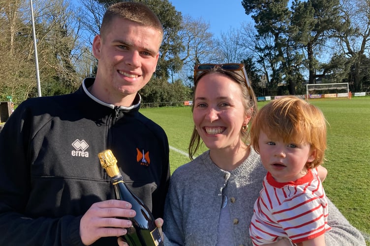 Wellington's Man of the Match Jacob Shore with Kitty Tredwin of sponsors H Tredwin & Son and another member of the Tredwin family, Magnus, grandson of club legend Mick Gough.