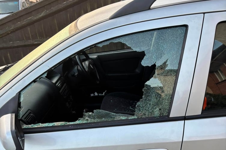 The smashed car window at the home of Brian Carpenter in Wellington