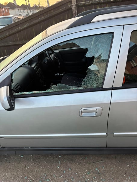 The smashed car window at the home of Brian Carpenter in Wellington