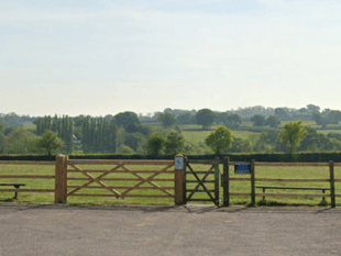 Residents "rattled" after caravans break into playing field