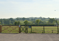 Residents "rattled" by caravan "encampment" in West Buckland playing field