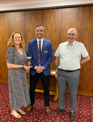 Winners of the Pattemore Cup Mixed Greensomes Competition, centre Richard Goodman club captain, left Kate Foster and Steve Cross.