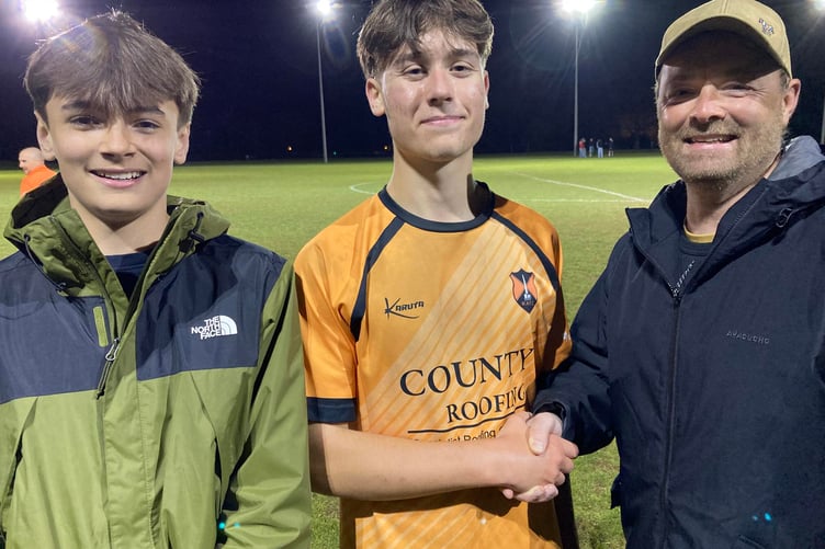 Man of the Match Harry Chetland is pictured with sponsors Phil and Lucas Bell of L & B Haulag