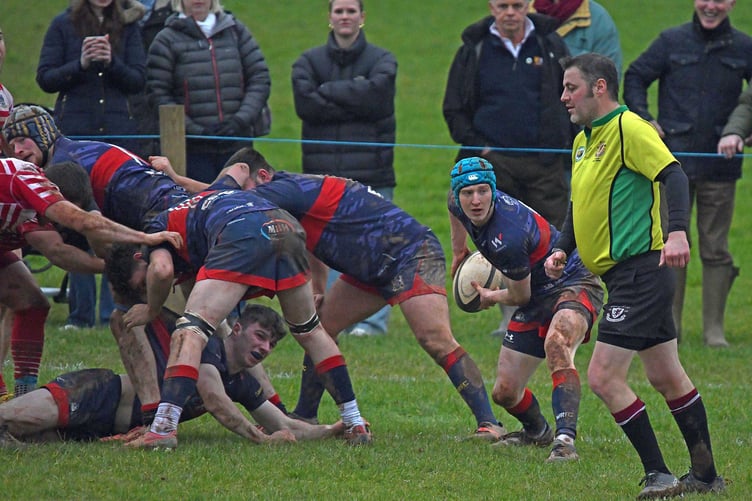 Tom Pike sets up an attack for Wiveliscombe