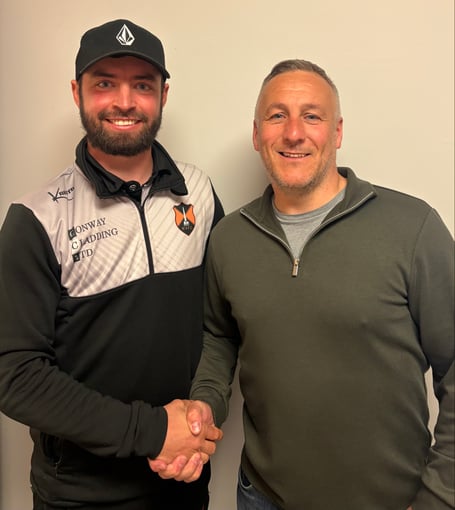 Wellington Reserves' Man of the Match Jack Bryant is pictured with Richard Bethall, manager of the club's U7s who sponsored the game.