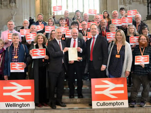 30-strong group travels to Parliament to push for town train station