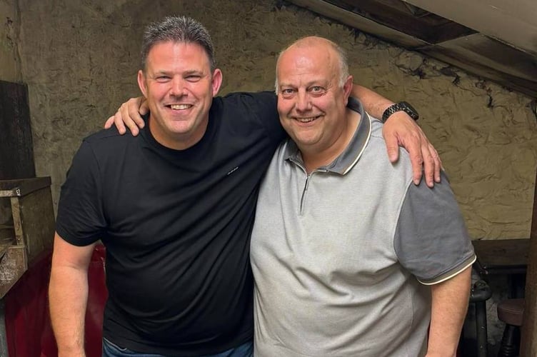 Pairs winner Darren Sparks (left) with teammate Kevin Sedgebeer who also won the singles competition