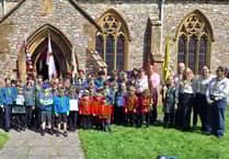 Hemyock scouts parade through village and hold church service for St George's Day