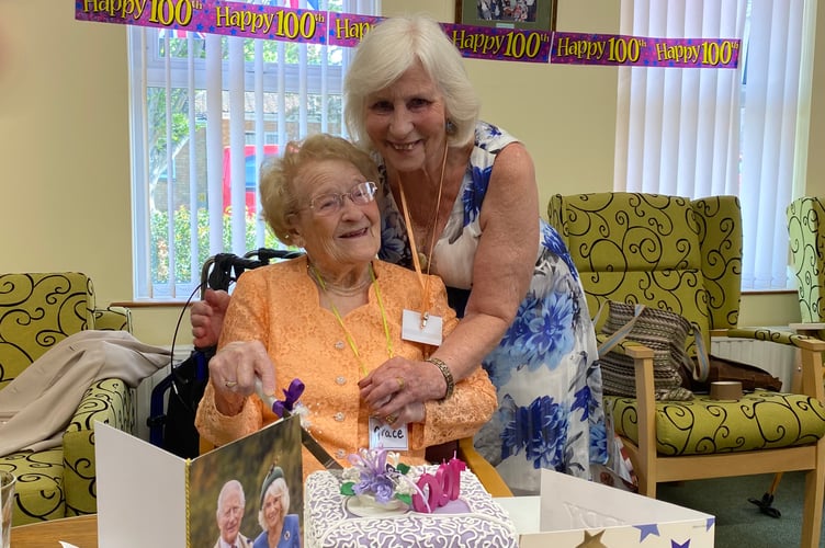 Grace Trovel and the maker of her birthday cake Yve Wallbridge