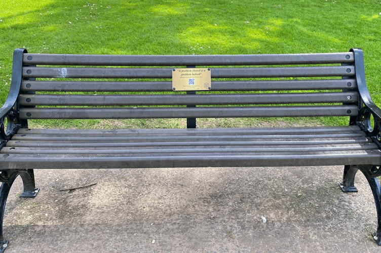 One of the town's benches now with its new plaque for mental health awareness