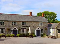 Candlelight carols as village celebrates reopened pub