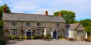 Candlelight carols as village celebrates reopened pub