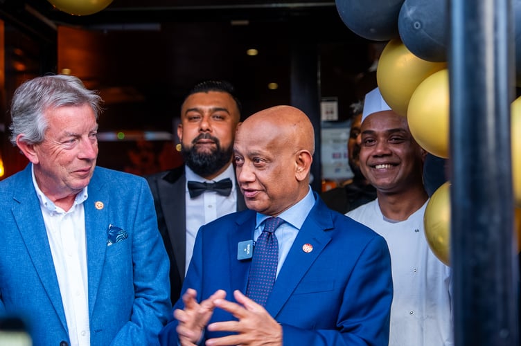 Clinton Rogers and Wellington Tandoori's Mr Khan at the official restaurant opening