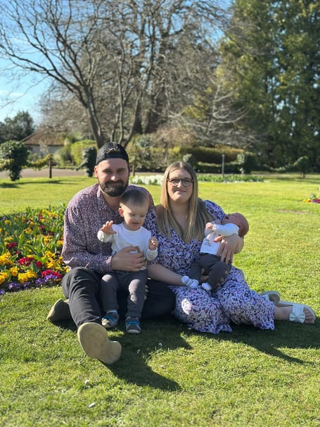 Ellie Veale, her partner, and two sons aged 23 and 3 months