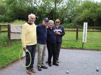Rain falls during mixed doubles petanque event 