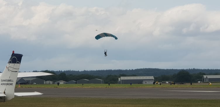 Tandem skydivers at Dunkeswell Aerodrome about to land.