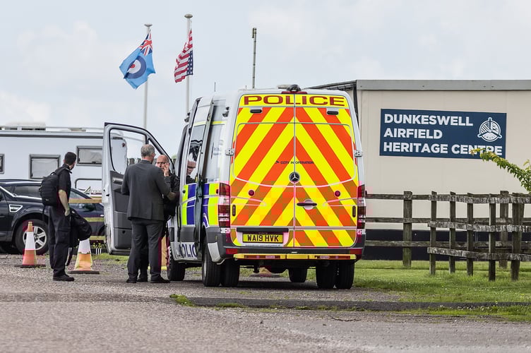 General view of police and forensics teams near Dunkeswell Airfield including Skydive Buzz, where two skydivers died after a tragic accident, involving a tandem jump on Friday June 13th.