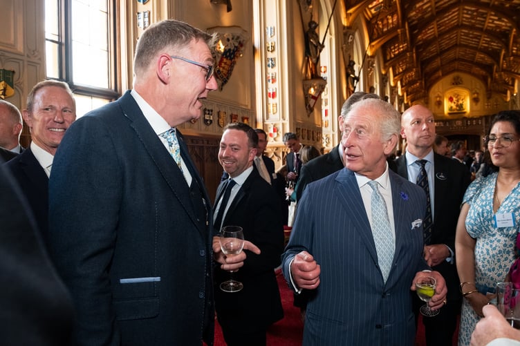 Rob Hanson, managing director of Wellington's John Packer Musical Instruments, talking with King Charles during a reception in Windsor Castle. PHOTO: Alex Lloyd Photography.
