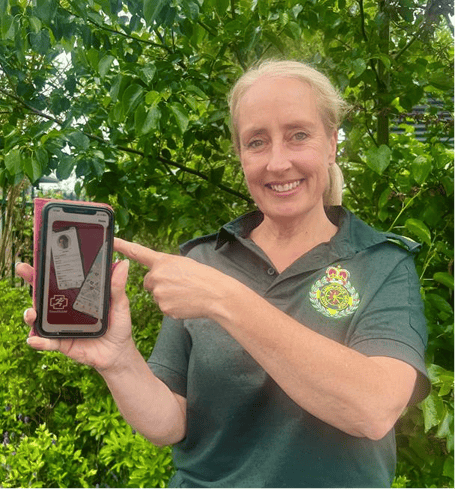 Ambulance service community engagement and training officer Domonique Hobbs with the 'GoodSAM' app.