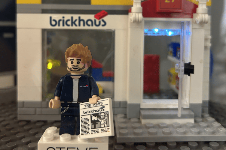 Steve James as a LEGO figurine outside the Brickhaus café