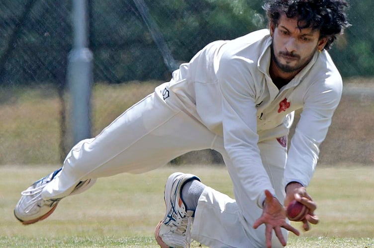 Lakshan Edirisinghe makes a catch for Wellington