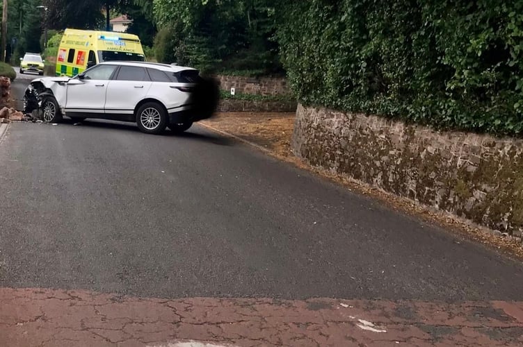 The front of a four-by-four is damaged in a collision on Pyles Thorne Road