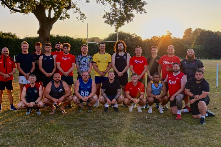 Rebels Rugby players line up before training