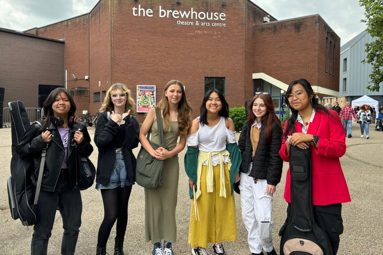 Band members Leila Cruz, Ella Pruden, Molly Lock, Nicole Padilla, Asher Lee and Karylle Perocho at the Tyca Festival 2024