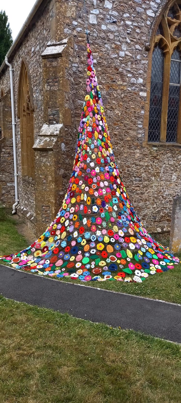 The Poppy Club hung a beautiful handcrafted Fall cascading from the church wall at the Hemyock fete