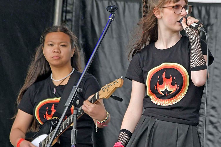 Slowburne performing at Welliestock