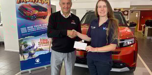 Car dealer sponsors charity head shave