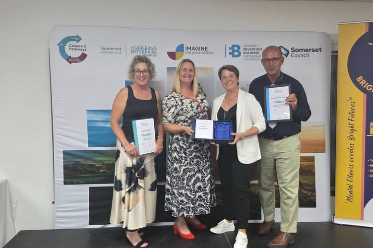 Charity Hunt, Sarah Westwood, Polly Matthews and Patrick Redwood accepting the award for Best Careers Focused Secondary School