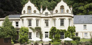 Twelve stations tackle country house fire