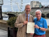 Skydiver and volunteer, 86, receives parliamentary recognition