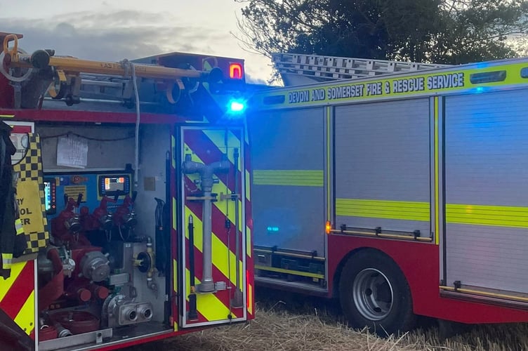 Fire crews attend a combine harvester fire outside Wellington