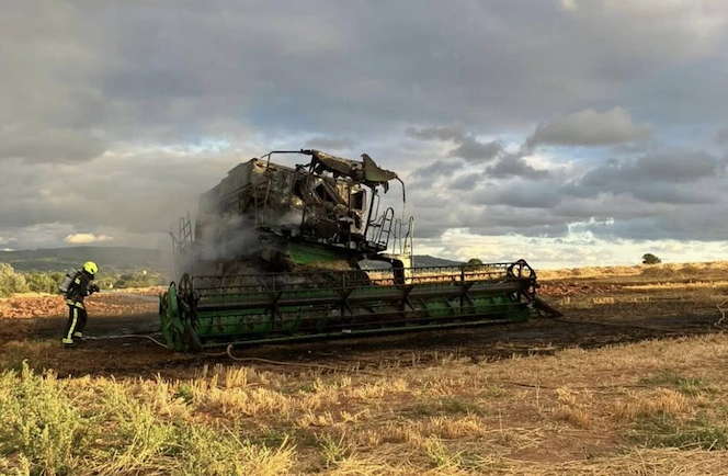 A combine harvester caught fire outside Wellington on Tuesday, July 29