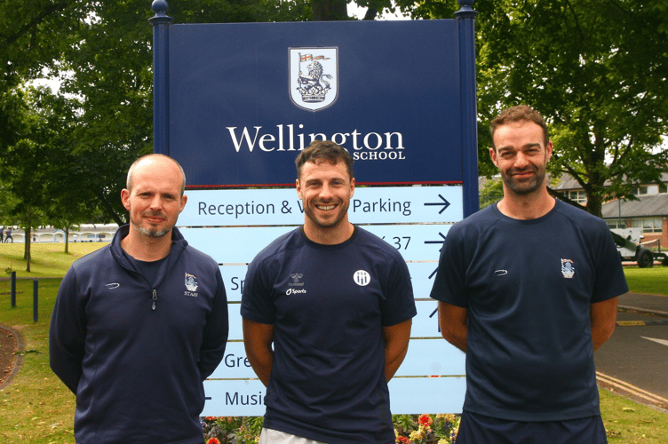 Wellington School’s Head of Rugby Will Garrett (left) and Director of Sport Luke Foot (right) welcome new coach Dorian Jones (centre)