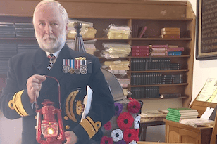 Rear Admiral Tim Lowe (Rtd) CBE with Lantern of Peace