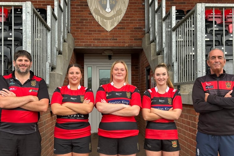 Left to right: Dominik Byrne (coach), Amy Lemon (vice-captain),   Taylor Wetherall-Davies (captain), Brianne Whelan (vice-captain), Hugh Barrett (coach).
