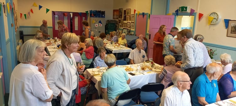 Villagers enjoy a 'tipsy afternoon tea' fund-raising event in Hemyock.