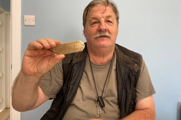 Barry Lamb hopes to reunite this plaque with the family of Millie Heal